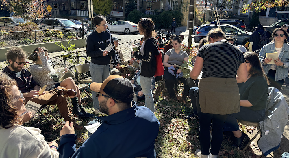 A group of new NSP members chatting with each.other in a church yard